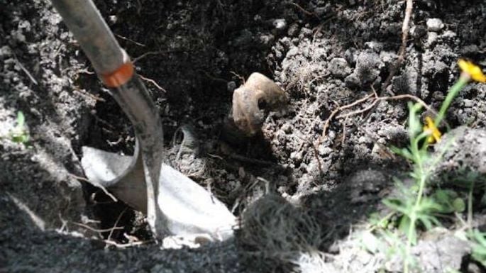 Recuperan 17 cuerpos en fosa clandestina